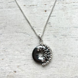 Small Hematite Lyra necklace